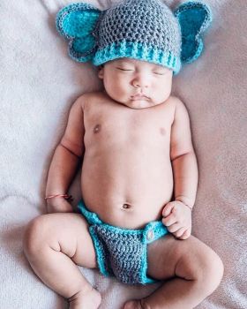 Blue hat and diaper holder