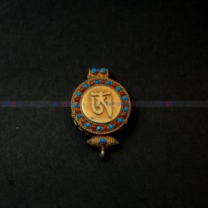 Tibetan om design pendant.
